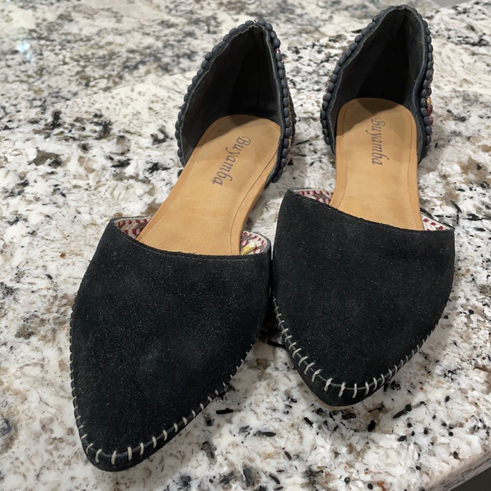 Buyamba fun flat in suede leather and beaded heel detail.